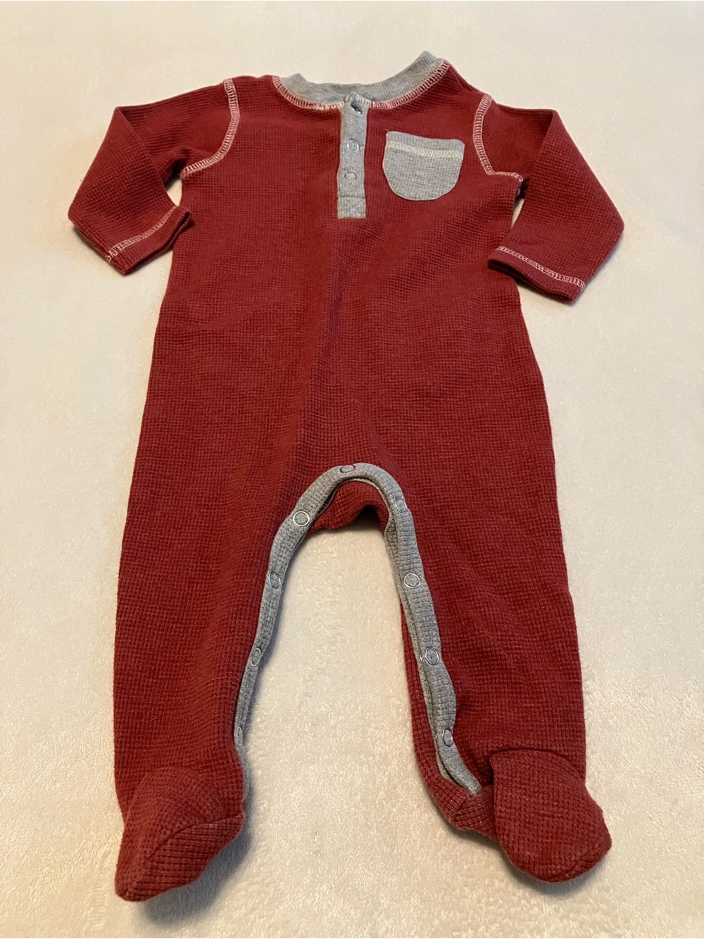 Cozy Red Waffle-Knit Baby One-Piece with Chest Pocket